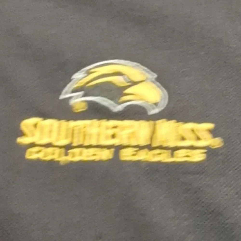 Southern Miss Golden Eagles men's black Antigua Polo shirt Large school logo